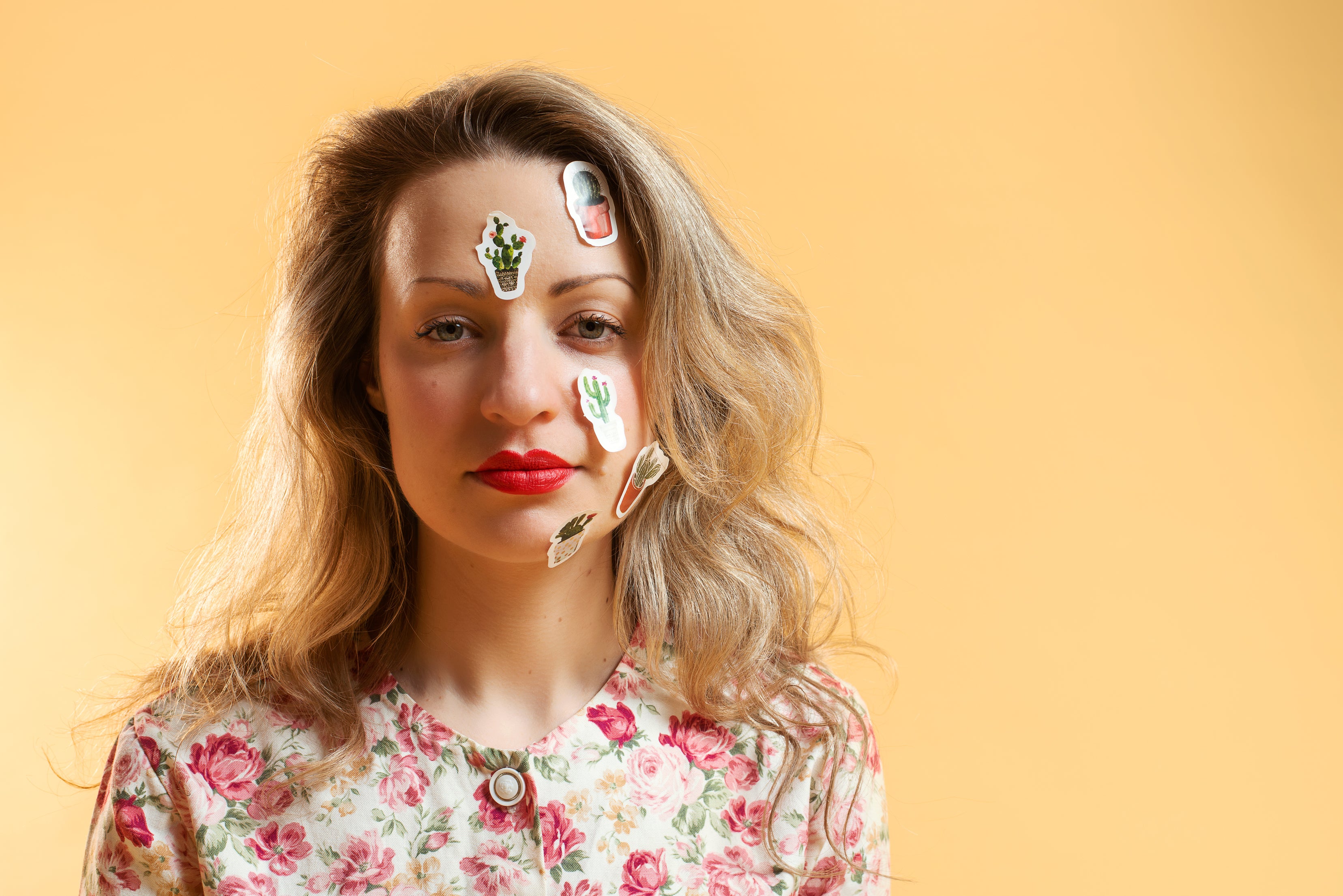 Girl with custom stickers on face